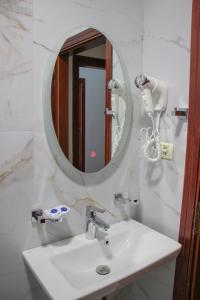 Koupelna v ubytování Hotel Bleta