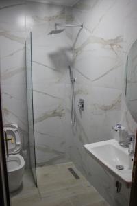 Koupelna v ubytování Hotel Bleta