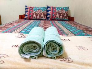 Rúm í herbergi á Ngampilan Backpacker Hostel
