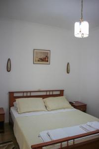 Postel nebo postele na pokoji v ubytování Hotel Bleta