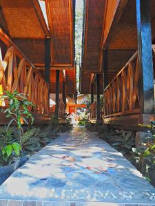 Foto da galeria de Castaway Native Huts em San Vicente