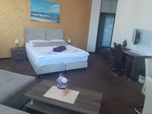 Postel nebo postele na pokoji v ubytování Hotel Usce