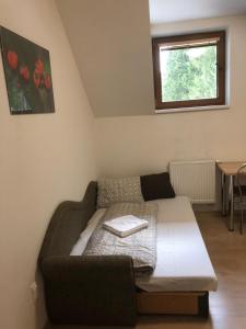 Postel nebo postele na pokoji v ubytování Chata Spálená Správa TANAPu