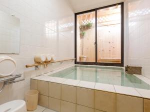 Vannituba majutusasutuses Tabist International Hotel Kaike