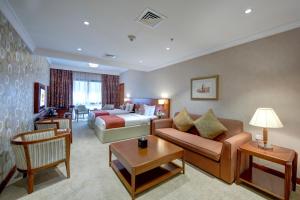 Cama ou camas em um quarto em Donatello Hotel