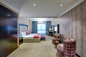 Cama ou camas em um quarto em Donatello Hotel