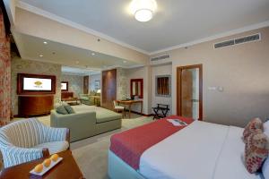 Cama ou camas em um quarto em Donatello Hotel