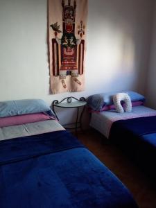 Postel nebo postele na pokoji v ubytování Loft Castelló