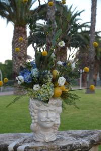 A garden outside Orizzonte Acireale Hotel