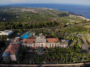 an aerial view of a resort with a swimming pool at Orizzonte Acireale Hotel in Acireale