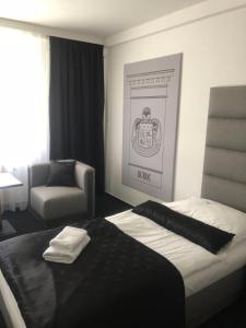 Posteľ alebo postele v izbe v ubytovaní A-Austerlitz Hotel