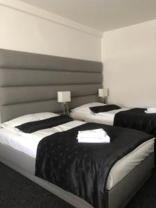 Posteľ alebo postele v izbe v ubytovaní A-Austerlitz Hotel