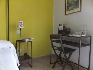 Postel nebo postele na pokoji v ubytování Cascina Antonini
