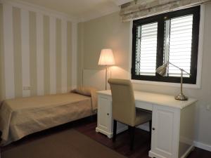Posteľ alebo postele v izbe v ubytovaní Casa Rakel, apartamento en el centro de Los Llanos