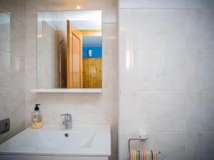A bathroom at Apartment Segrelles by Interhome