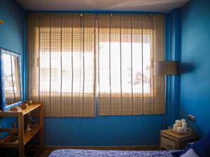 A bed or beds in a room at Apartment Segrelles by Interhome