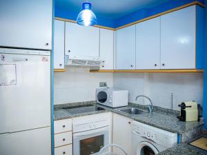 A kitchen or kitchenette at Apartment Segrelles by Interhome