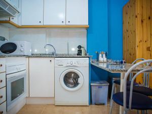 A kitchen or kitchenette at Apartment Segrelles by Interhome