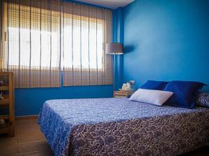 A bed or beds in a room at Apartment Segrelles by Interhome