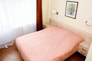 Cama o camas de una habitación en Voyage Hotel