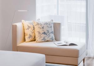 Postel nebo postele na pokoji v ubytování FlyZoo Hotel - Alibaba Future Hotel