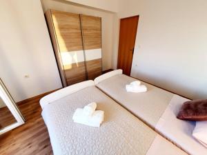 Postel nebo postele na pokoji v ubytování Apartman Šime