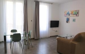 Televízia a/alebo spoločenská miestnosť v ubytovaní Balaustrada Apartments