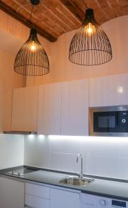 Kuchyňa alebo kuchynka v ubytovaní Balaustrada Apartments