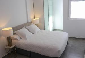 Posteľ alebo postele v izbe v ubytovaní Balaustrada Apartments