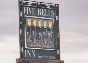 The logo or sign for the inn 