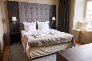 Letto o letti in una camera di Clarion Hotel Post