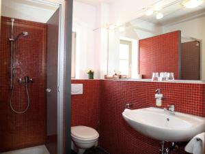 Koupelna v ubytování Hotel Weinblatt