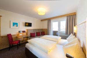 Postelja oz. postelje v sobi nastanitve Hotel Garni Entstrasser