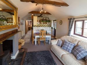 Posezení v ubytování Cwm Derw Cottage + 6 fotografií