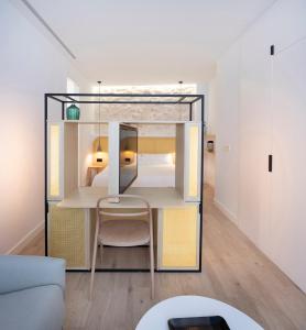 Postel nebo postele na pokoji v ubytování Hotel Serawa Alicante