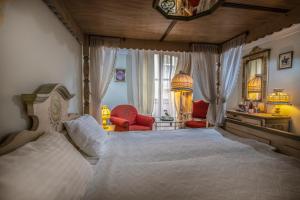 Säng eller sängar i ett rum på Corvin Hotel Budapest Sissi Wing