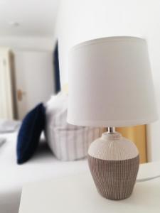 Postel nebo postele na pokoji v ubytování Hotel Garni Friesenhuus
