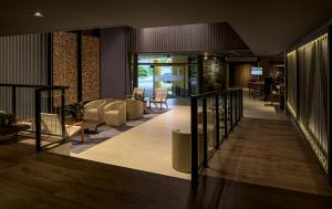 Uma área de estar em Hotel Cassino Tower Curitiba Aeroporto By Nacional Inn