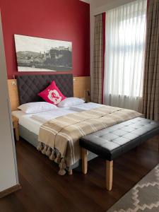 Łóżko lub łóżka w pokoju w obiekcie Hotel Villa Carlton - Adults Only