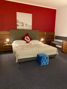 Łóżko lub łóżka w pokoju w obiekcie Hotel Villa Carlton - Adults Only