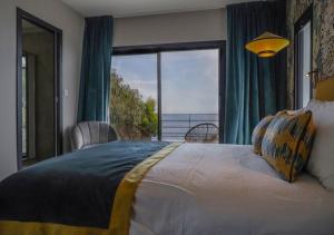 Katil atau katil-katil dalam bilik di Casa Dalessio 3 - Villa Vue Mer et Piscine +22 gambar