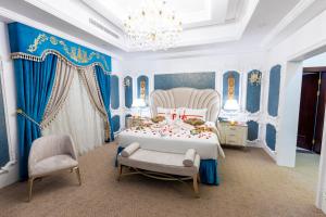 Voodi või voodid majutusasutuse Remaj Hotel toas