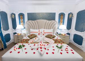 Voodi või voodid majutusasutuse Remaj Hotel toas