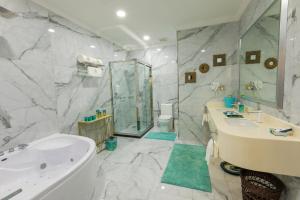 Vannituba majutusasutuses Remaj Hotel
