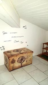 a wooden box on a wall with writing on the wall at Attico mansardato davanti Casinò in Sanremo