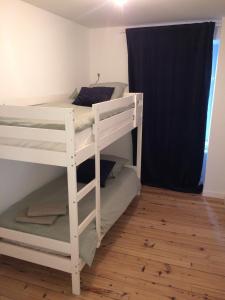 Postel nebo postele na pokoji v ubytování Villa la Korrigane vue mer cuisine privée