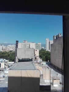 a view of a city from a window at Andes 1 in Mendoza