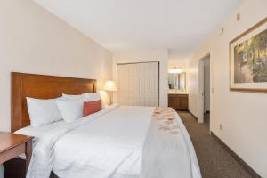 Voodi või voodid majutusasutuse Residences at Daniel Webster toas