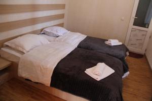 Letto o letti in una camera di Teo Guesthouse and Camping in Mestia