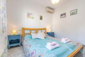 Posteľ alebo postele v izbe v ubytovaní Apart-rent Villa Creus 0038